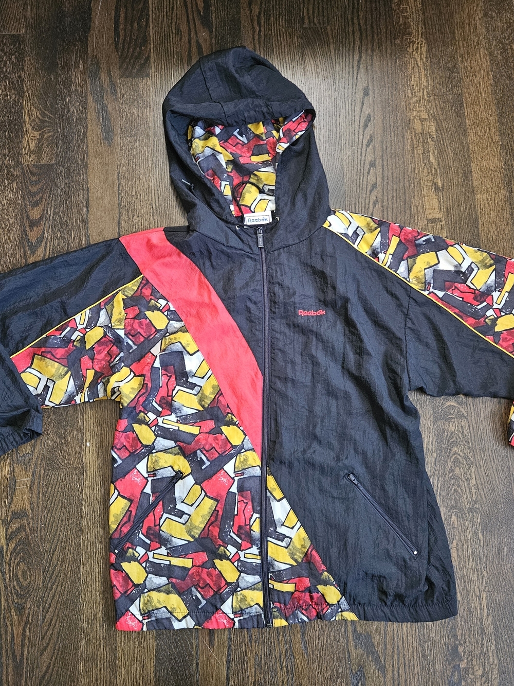 Vintage Reebok Black Jacket with Red & Yellow Graphic Panels